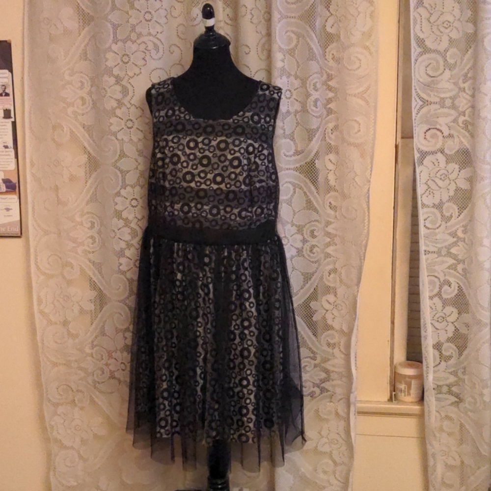 Dress with a black overlay
